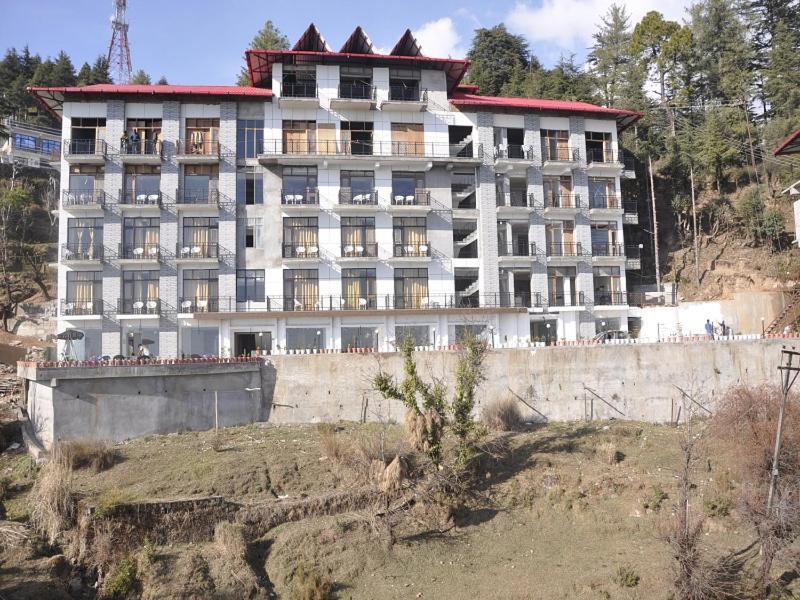 Oyo 28425 Dal Lake Resort Dharamshala Esterno foto